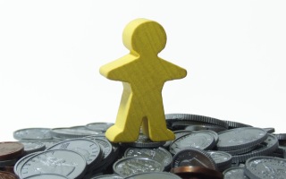 person top of money